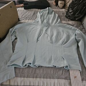 Light Blue Women's Hoodie NWT SIZE L CROPPED. Tailor Pleats In Front And Back